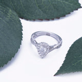 Pear Shaped Halo Infinity Spiral Diamond Engagement Ring in 18k White Gold - Artisan Carat