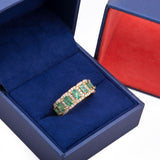 Halo Green Emerald and Diamond Eternity Band Ring in 18k Yellow Gold.