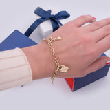 Charming Set of Key and Lock Charm Bracelet in 14k Yellow Gold - Artisan Carat