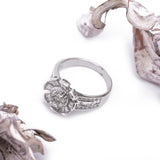 Flower Setted Starburst Halo Diamond Channel Set Ring in 18k White Gold - Artisan Carat